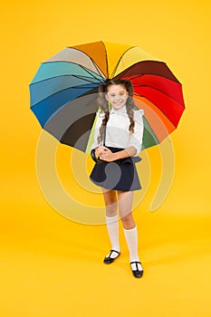 Positive vibes. Everything under control. Fancy schoolgirl. Girl with umbrella. Rainy day. Happy childhood. Rainbow