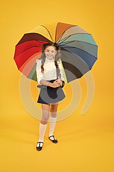 Positive vibes. Everything under control. Fancy schoolgirl. Girl with umbrella. Rainy day. Happy childhood. Rainbow