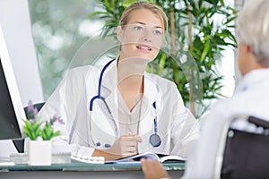 Positive woman doctor in office hospital