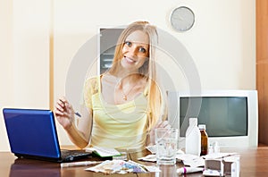 Positive woman reading about medications on the Internet