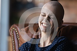 Positive young sick female patient with cancer feeling happy