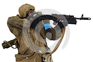 Post-apocalyptic fiction concept - stalker in gas mask with ak-47 gun