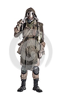 Post apocalyptic survivor in gas mask and rags