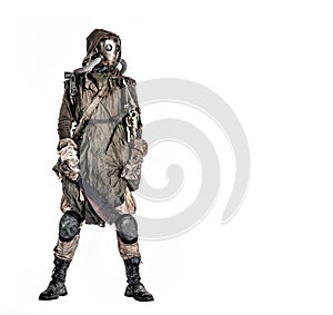 Post apocalyptic survivor in gas mask and rags