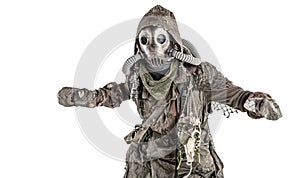 Post apocalyptic survivor in gas mask and rags