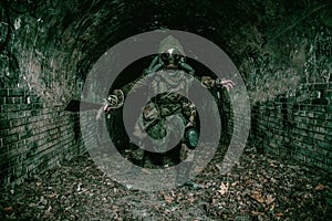 Post apocalyptic underground creature in gas mask