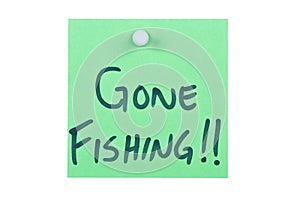 Post it note on wood