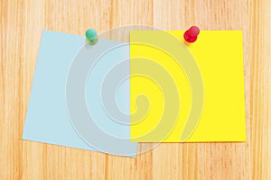 Post-It Notes on Wood Desk