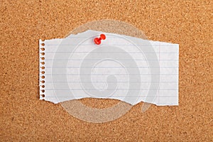 Pinned blank paper note on background