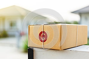 Post office box in front of the house.