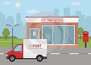 Post office building, delivery truck and mailbox on city background.