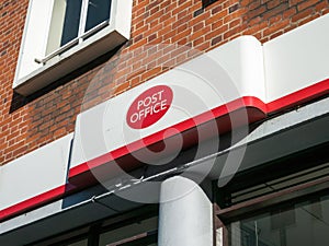 The Post office sign logo in Dalston, London, UK.