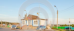 Post of road guard service outside the city in the countryside with patrolling old cars with special symbols and an inspection