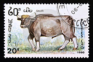 Postage stamp Laos 1990. Gaur Bos gaurus