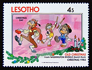 Postage stamp Lesotho 1983. Christmas Day Goofy, Donald, Mickey