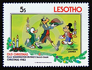 Postage stamp Lesotho 1983. The Christmas Dinner Donald, Goofy, Mickey