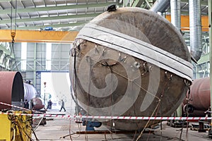 Post weld heat treatment to pressure vessel. It is a controlled process in which a material that has been welded is reheated.