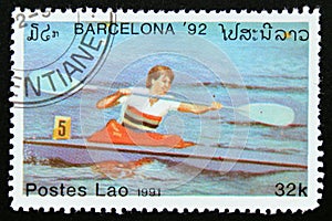 Postage stamp Laos 1991, Olympic Games one man kayak contestant