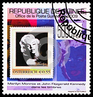 Postage stamp printed in Guinea shows Marilyn Monroe and J.F. Kennedy on stamps, Austria, serie, circa 2009