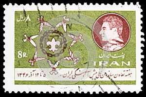 Postage stamp printed in Iran shows Scout badge surrounded by knotted neckerchiefs, Week of cooperation of the Boy Scouts serie,