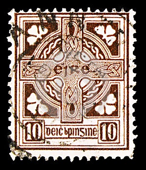 Postage stamp printed in Ireland shows Celtic Cross, 10 p - Irish penny, Symbols 1922-34 serie, circa 1923