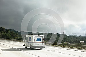 Postal Car on the Highway