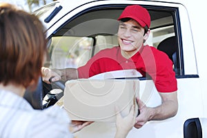 Postal delivery courier delivering photo