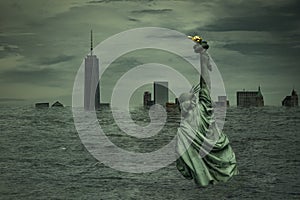 Postapocalyptic scenario and global warming concept with statue of liberty half covered by rising ocean level and Manhattan`s