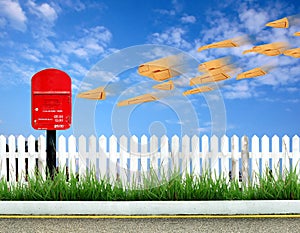 Postbox and brown envelope