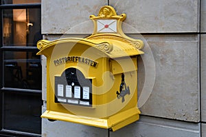 Postbriefkasten, old yellow decorative postbox
