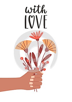 A postcard with a hand holding a bouquet of simple flowers and a handwritten phrase - With love. A symbol of love