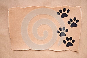 Postcard with paw foot trail icon, paper art style. Animal love concept, greeting card, invitation mockup