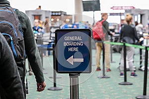 Posted sign in an airport read `General Boarding here`