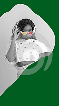 Poster. Contemporary art collage. Black and white portrait of young beautiful lady in headphones and drawn sunglasses