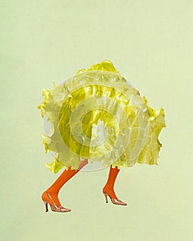 Poster. Contemporary art collage. Green salad, vegetable with female legs in vibrant tights and heels against green