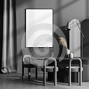 Poster in the dark grey art studio interior with table and stools