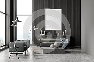 Poster in a dark grey panoramic living room with green furnishing