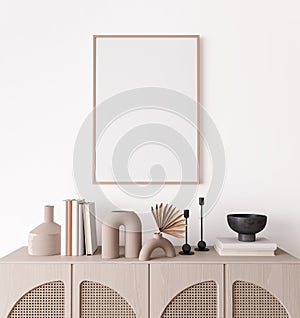 Poster frame mock up in living room interior, modern furniture and wooden decorative rattan cabinet