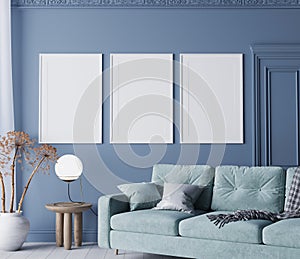 Poster frame mockup in classic blue living room with natural wooden furniture and comfy turquoise sofa