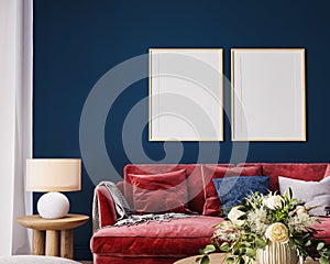 Poster frame mockup in living room interior with red sofa, wooden table and rattan home decoration in dark blue background