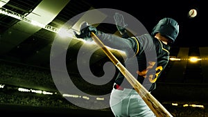 Poster with professional baseball player with baseball bat in action during match in crowed sport stadium at evening