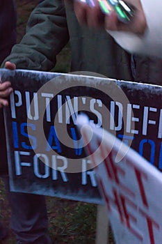 poster at a rally against Putin photo