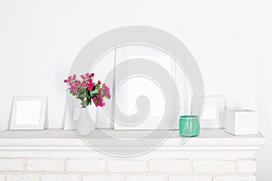 Poster and square frames mockup with decor elements, flowers and blank copy space on white background.