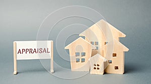 A poster with the word Appraisal and a miniature wooden house. Real estate. Rate the property / home. Evaluation. Apartments,