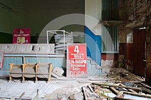 Posters with socialist slogans in abandoned building of former House of Culture in resettled village in Chernobyl exclusion zone