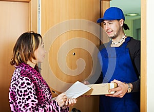 Postman delivered a package to woman