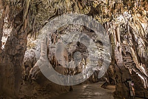 Postojna cave, Slovenia. Formations inside cave with stalactites and stalagmites