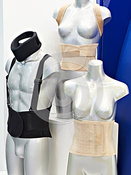 Postoperative bandages on mannequins in store
