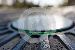 The posts that have gone underground glow green, allowing vehicle passage.