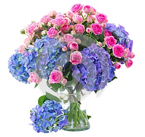 Posy of pink roses and blue hortensia flowers close up